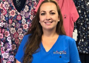 Woman business owner Reyna Chavez, of Scrubs on the Run