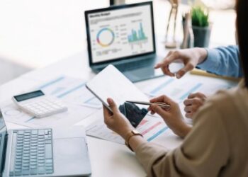 Business owner using cash flow forecast to make informed business decisions